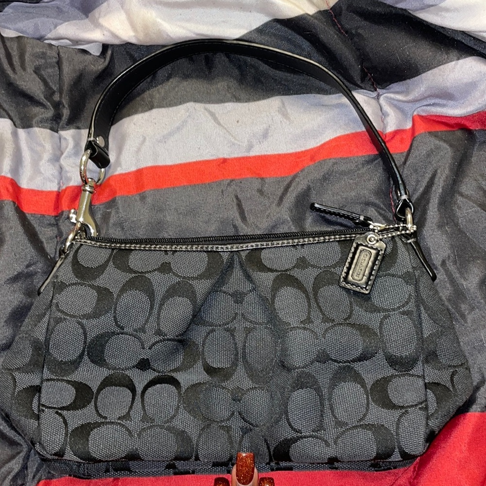 Vintage Black Coach shoulder bag.
